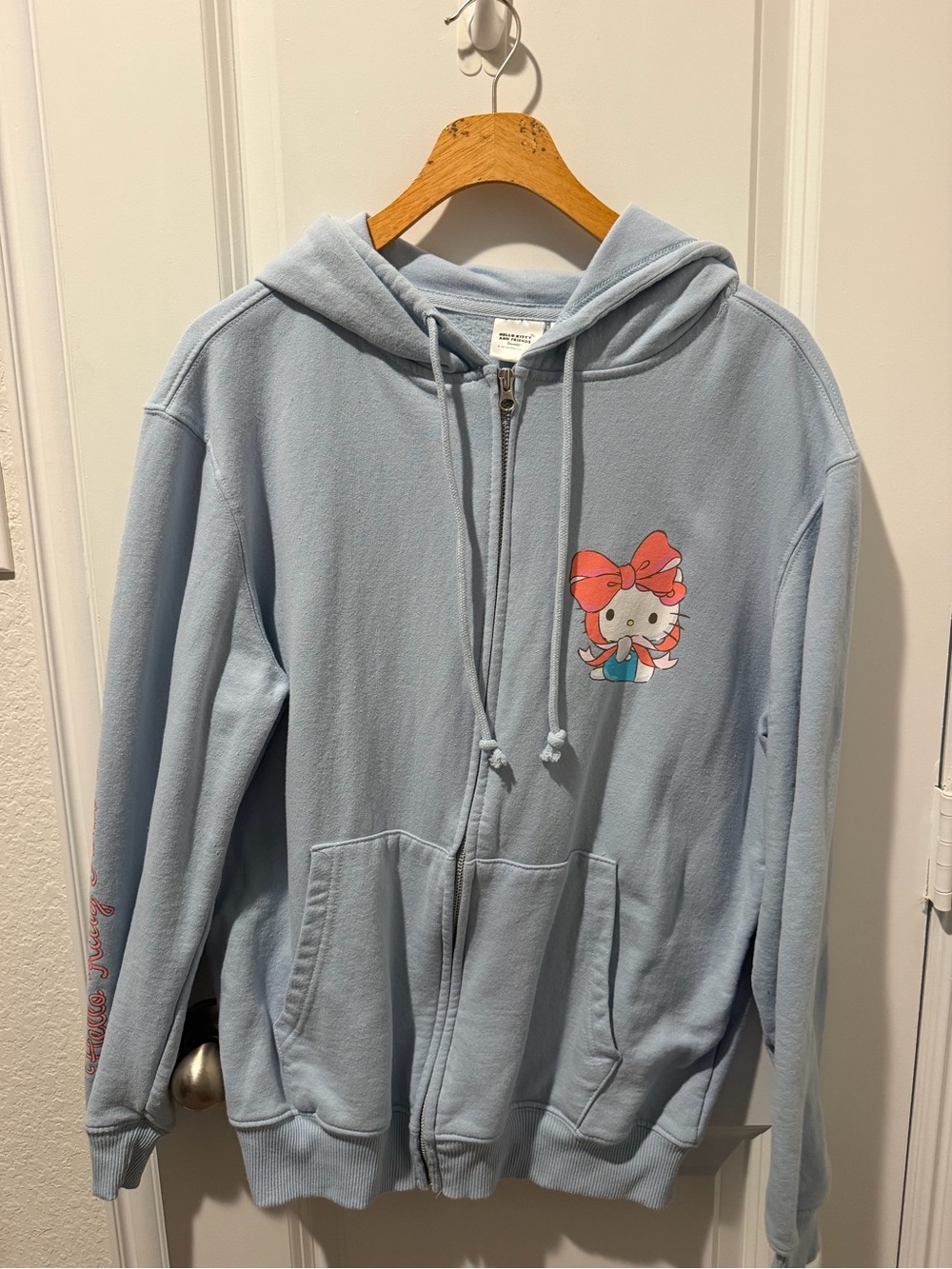Hello Kitty Light Blue Zip Hoodie with Pink Bow Graphic medium size.